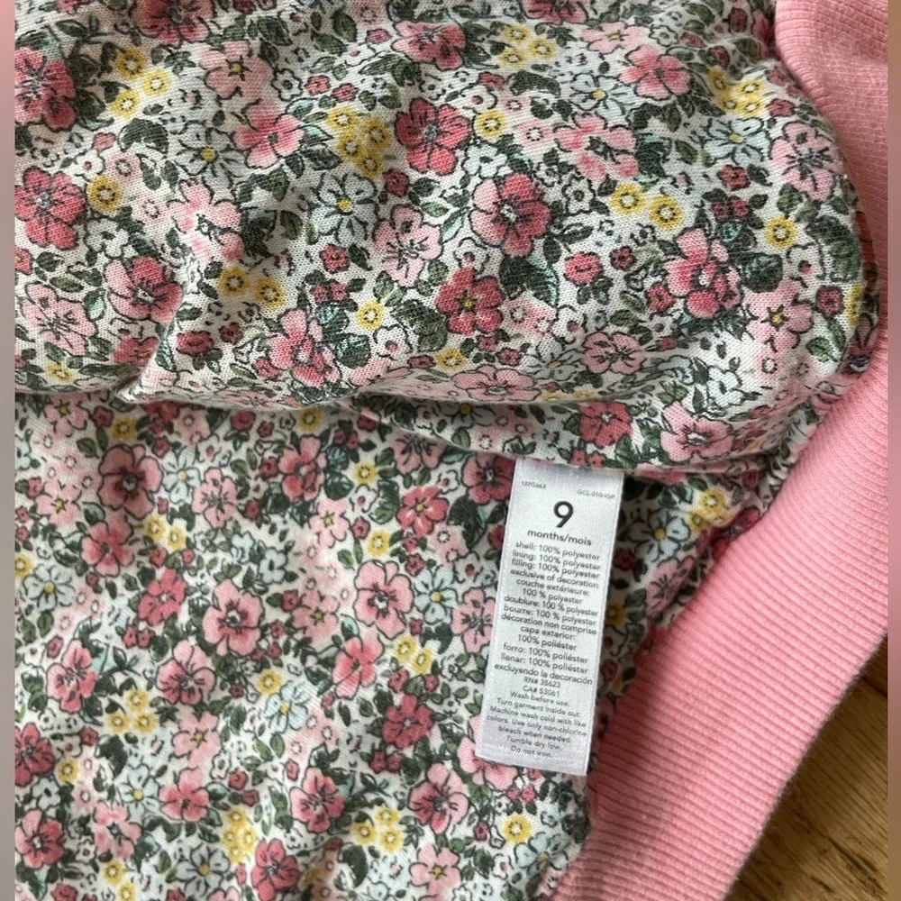 Quilted coat with floral details